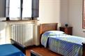 Camera spaziosa con tre posti letto